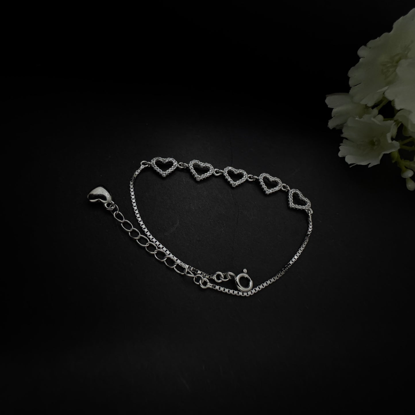 Silver Diamond Studded Hearts Bracelet