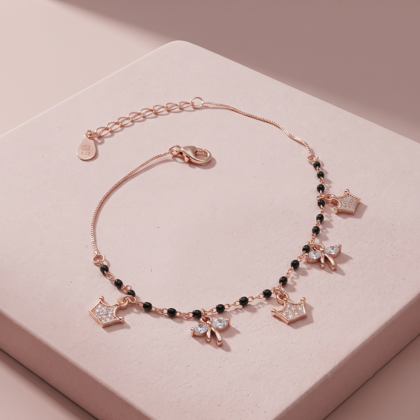 Rose Gold Plated Silver Queen & Bow Charms Bracelet