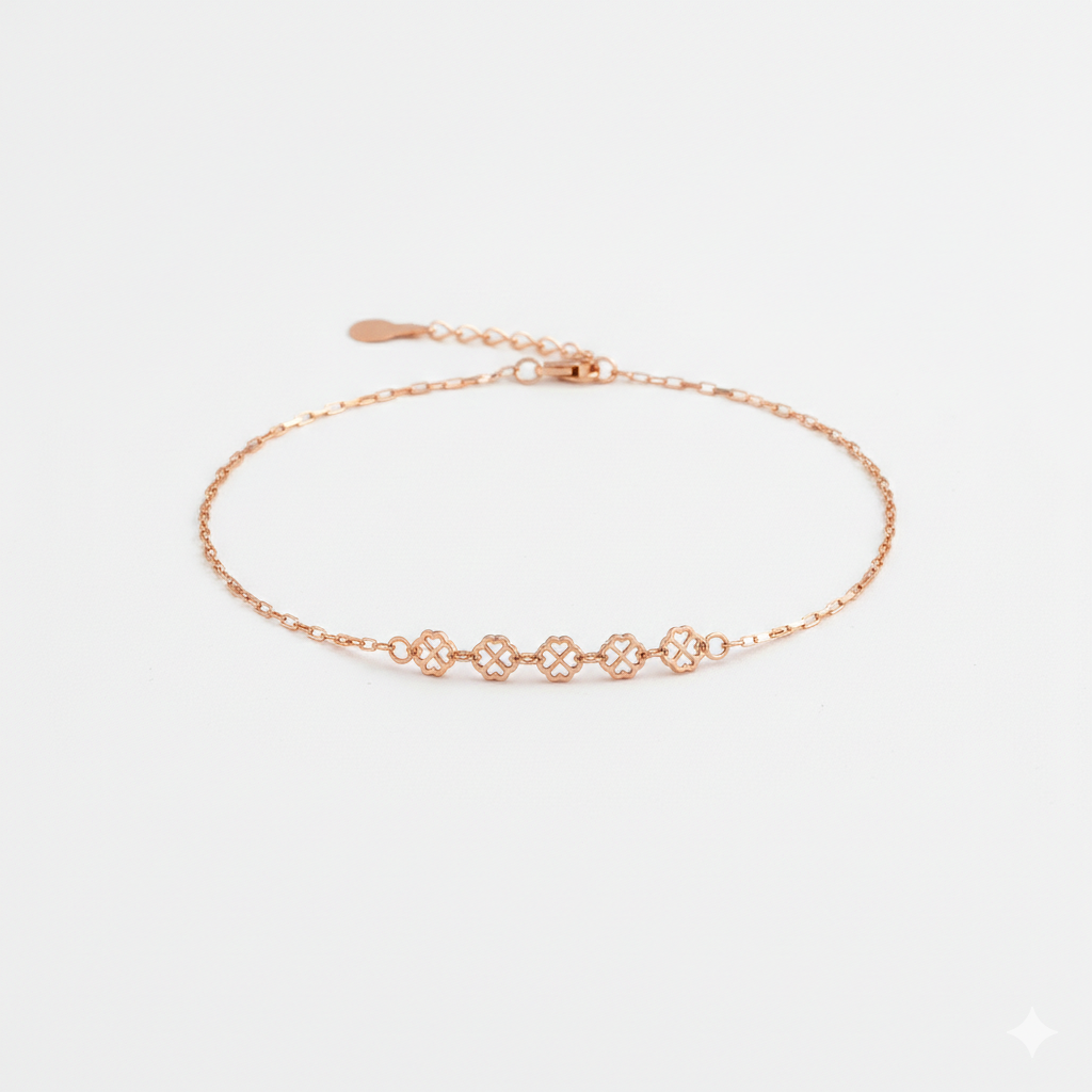 Rose gold bracelet on a light gray background