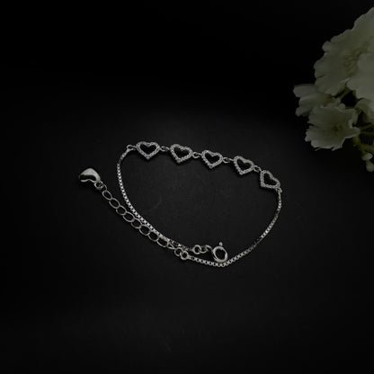 Silver Diamond Studded Hearts Bracelet