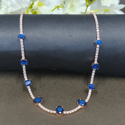 Bracelet with blue gemstones and clear stones on a dark surface