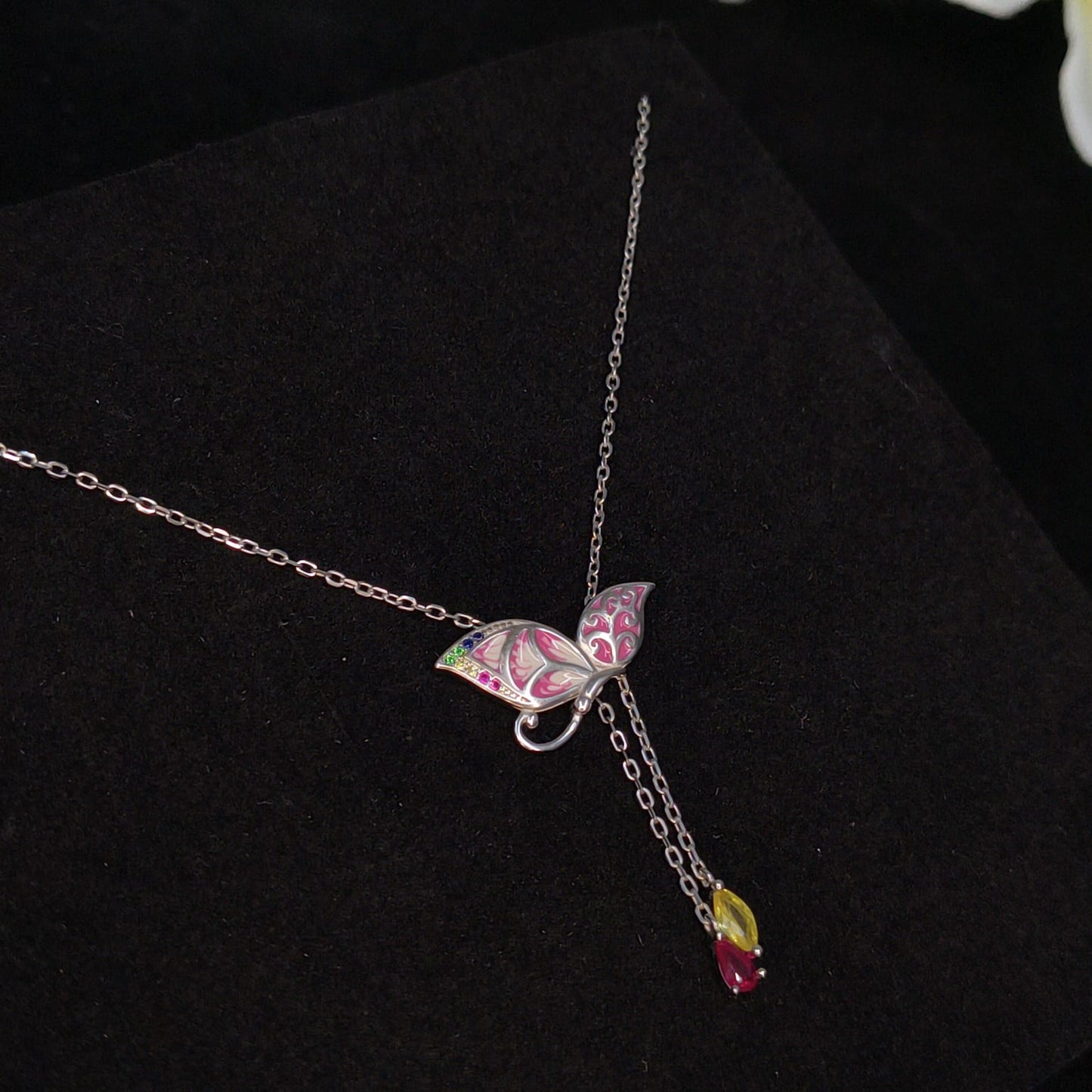 Necklace with a butterfly pendant on a black background