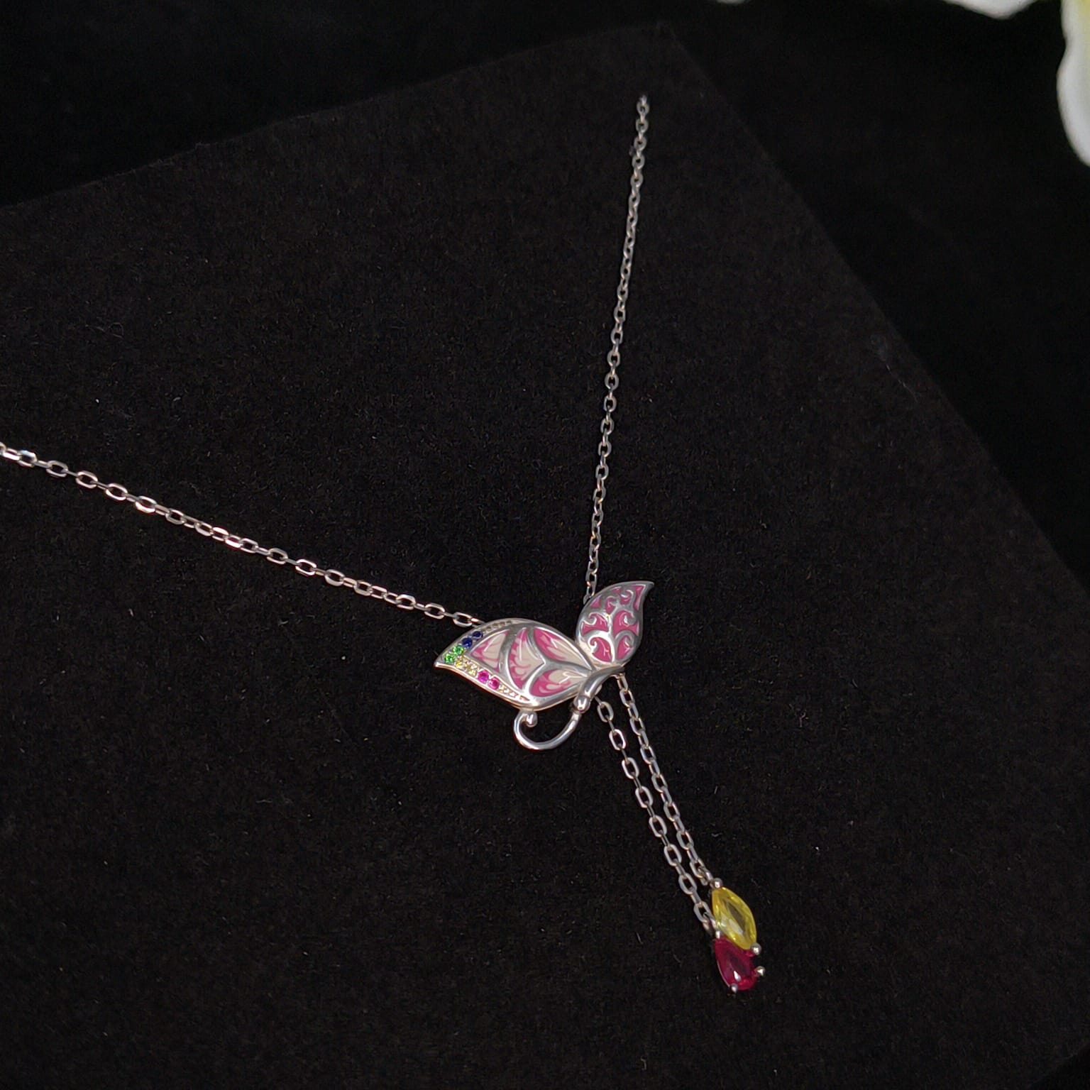 Necklace with a butterfly pendant on a black background