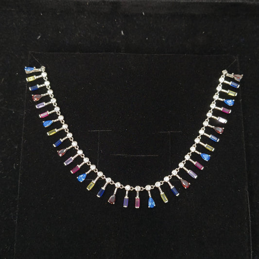 Necklace with multicolored beads on a black background