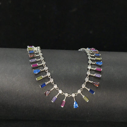 Necklace with multicolored gemstones on a dark surface